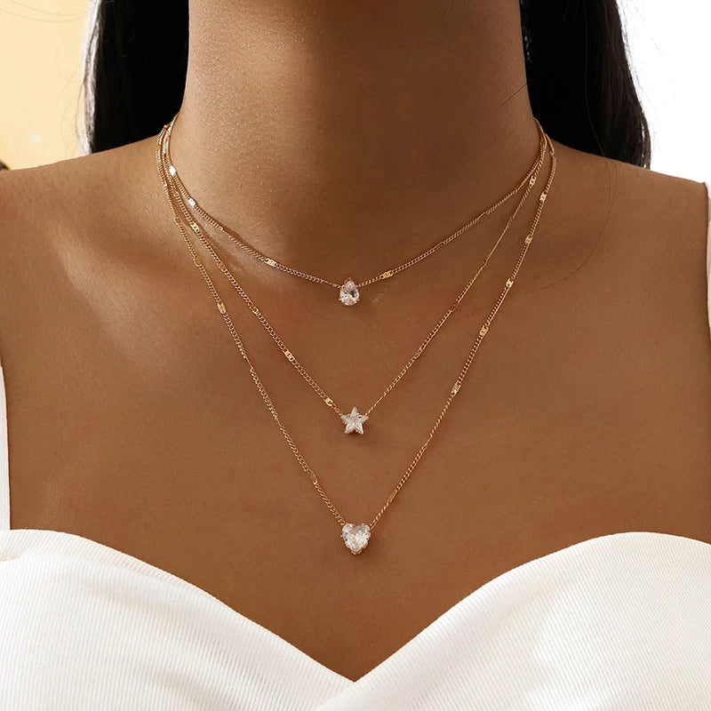 Three Hanging Necklaces with Gold Zirconia