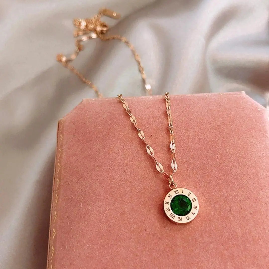 Timepiece Necklace with Emerald in Gold