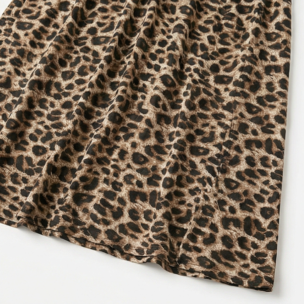 Anna-Berg | Statement Maxi Dress In Leopard Print With V-neck And Short Sleeves