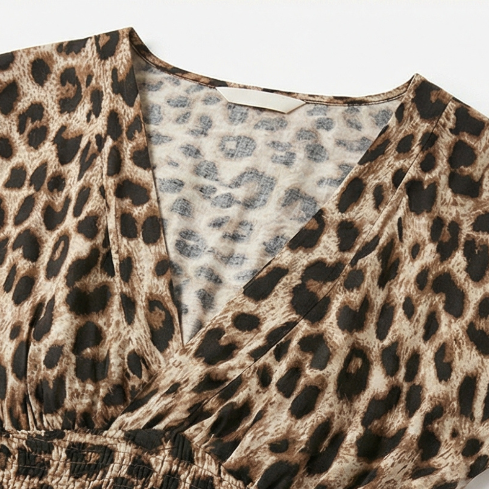 Anna-Berg | Statement Maxi Dress In Leopard Print With V-neck And Short Sleeves
